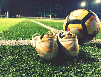 Close-up of soccer ball on field