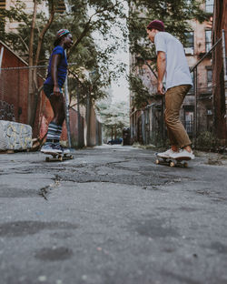 Man skateboarding on skateboard in city