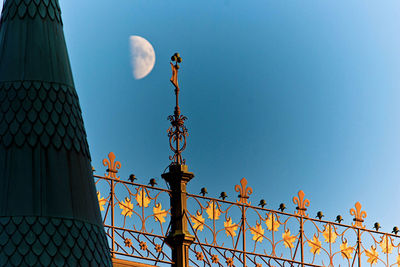 Low angle view of building against clear blue sky