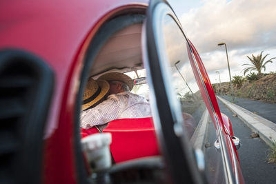 Senior couple kissing in car