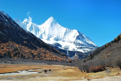 Scenic view of majestic mountain against sky