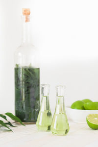 Close-up of wine bottles on table