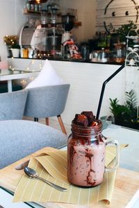 Close-up of coffee served on table