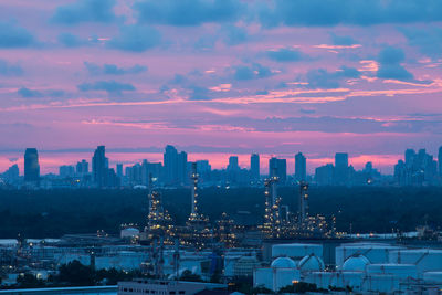 High angle view of buildings against sky during sunset