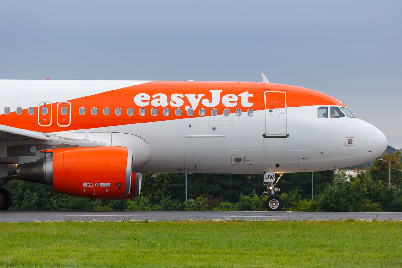 INFORMATION SIGN ON AIRPLANE AGAINST SKY