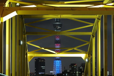 Low angle view of illuminated modern building at night