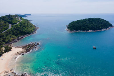 High angle view of bay against clear sky