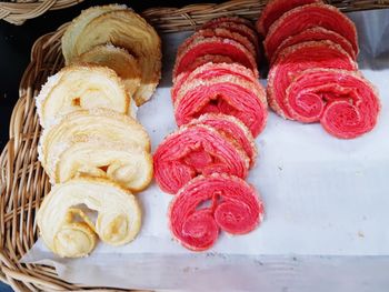 Close-up of sweet food for sale in wicker basket