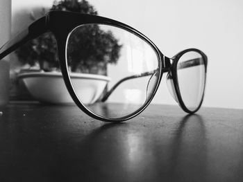 Close-up of sunglasses on table