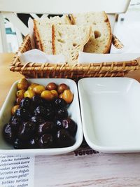 Close-up of fruits in plate on table