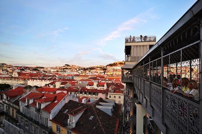 High angle view of buildings in city against sky