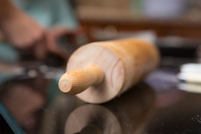 Close-up of snail on hand