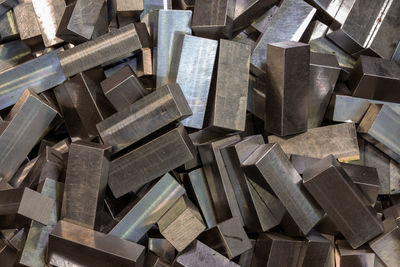 Pile of cuboid steel workpieces after surface grinding