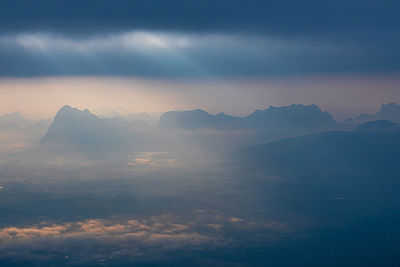 Scenic view of mountains against sky during sunset