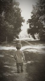 Boy jumping in park