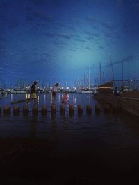 Scenic view of sea against sky at night