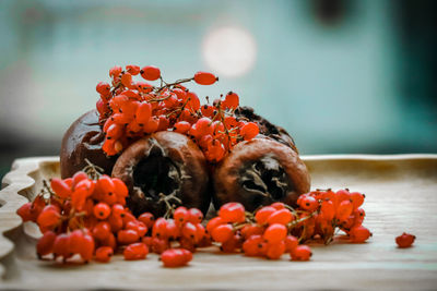 Close-up of tomatoes in plate on table