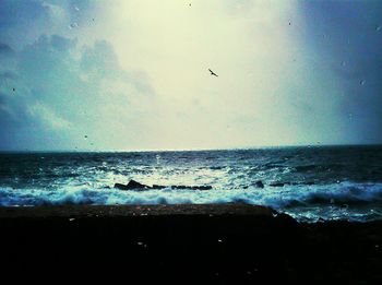 Scenic view of sea at sunset