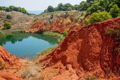 Scenic view of lake amidst rock formation