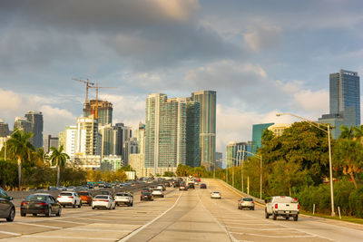 City street and modern buildings against sky