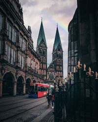 View of buildings against cloudy sky