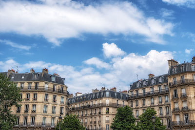 Paris style apartment with balconies and windows. taken near notre dame cathedral in paris, france