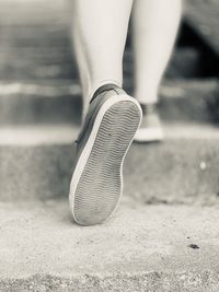 Low section of woman on steps