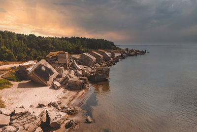 Ruins of bunkers on the beach of the baltic sea