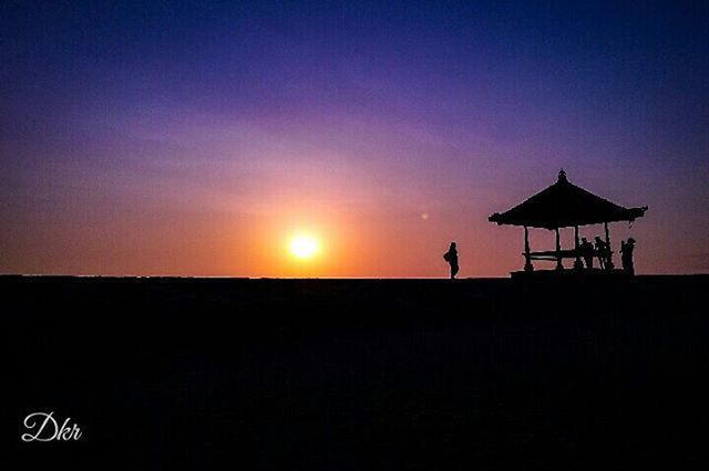 SILHOUETTE PEOPLE AT SUNSET