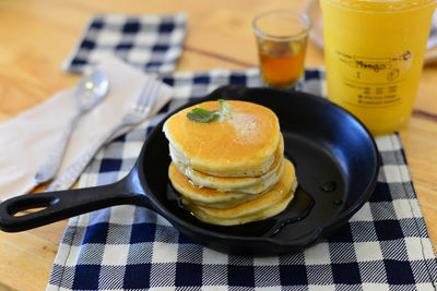 Close-up of pancakes in pan