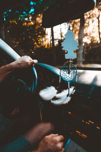 People hand holding car