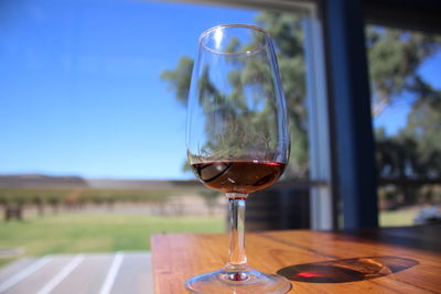 Close-up of wineglass on table