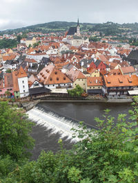 Tower of castle and rooftops in old town of cesky krumlov. 14th of july 2019, czech republic.