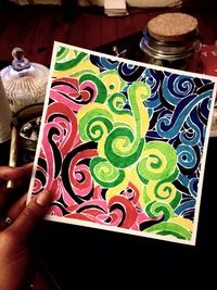 Cropped image of man holding hands