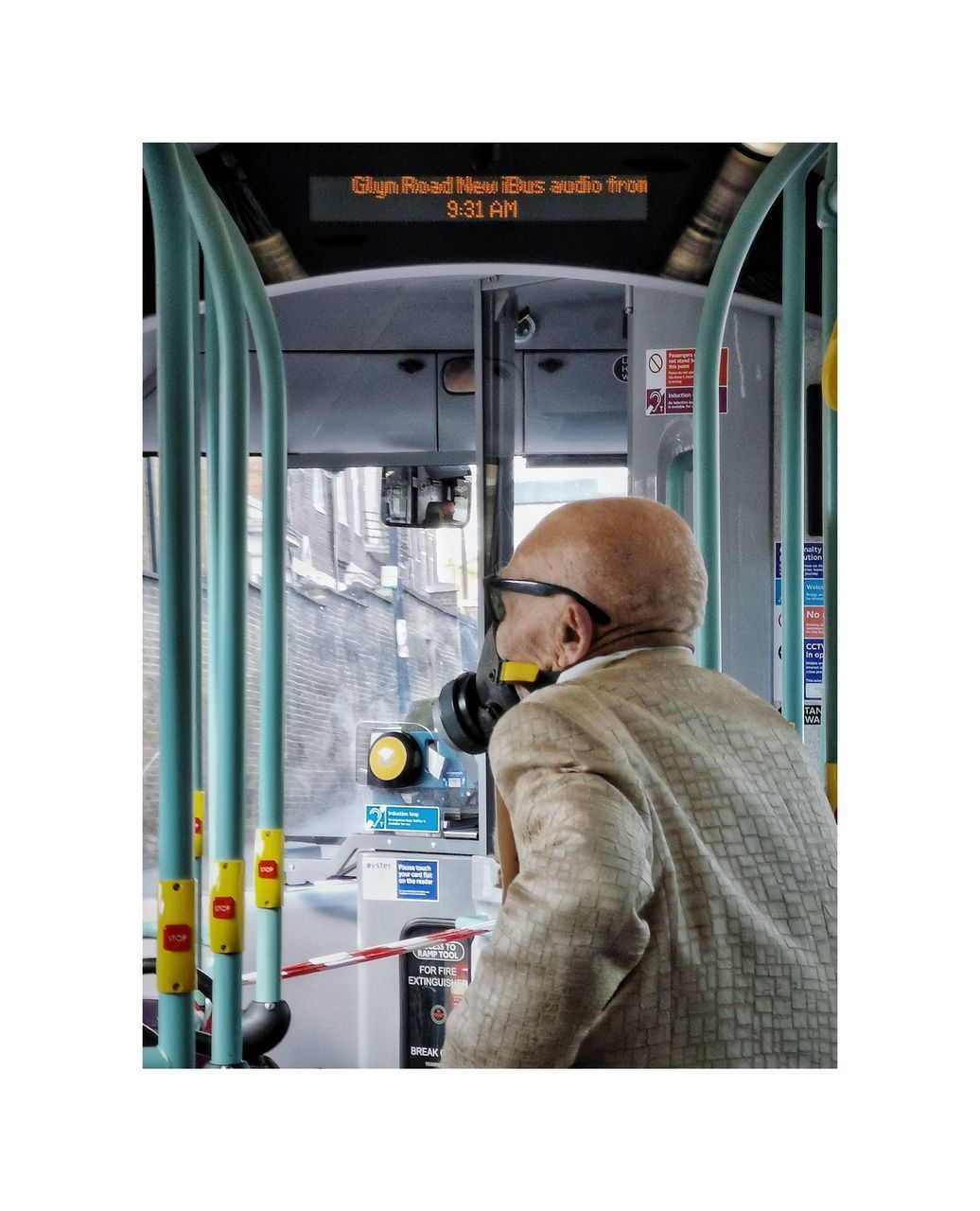 FULL LENGTH REAR VIEW OF MAN WORKING ON BUS