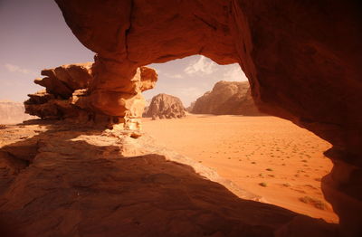 Low angle view of rock formations against sky during sunny day