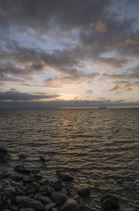 Scenic view of sea at sunset