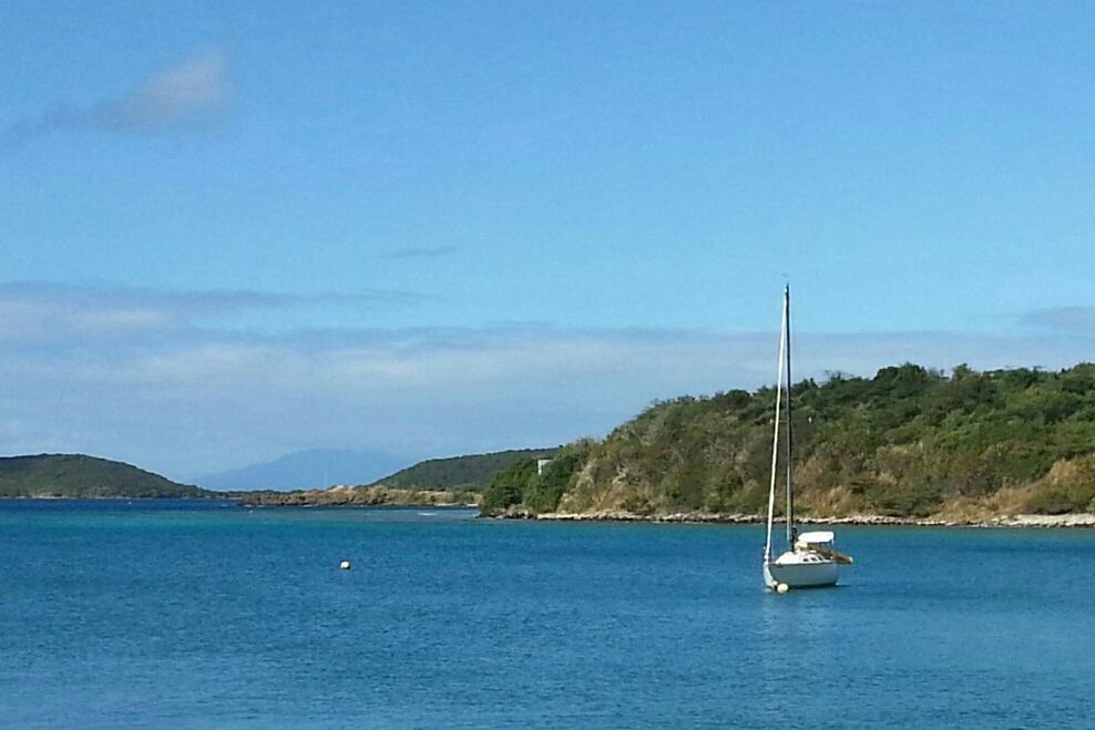 nautical vessel, water, transportation, boat, mode of transport, mountain, tranquil scene, sea, tranquility, scenics, blue, waterfront, beauty in nature, sky, moored, nature, tree, sailboat, travel, sailing