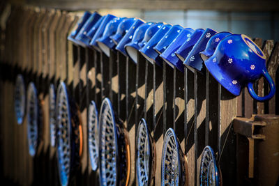 Close-up of clothes hanging on rack in store