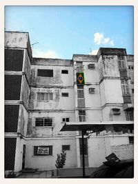 Low angle view of old building against sky