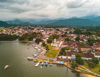 High angle view of townscape by river