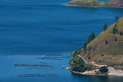 High angle view of boats on sea shore