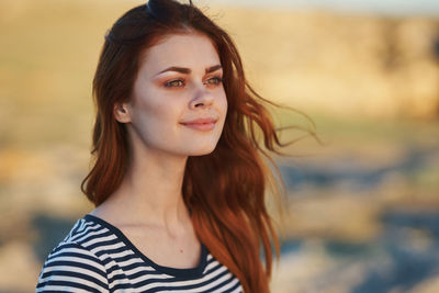 Portrait of smiling young woman