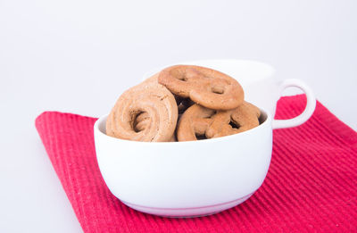 Close-up of cookies against white background