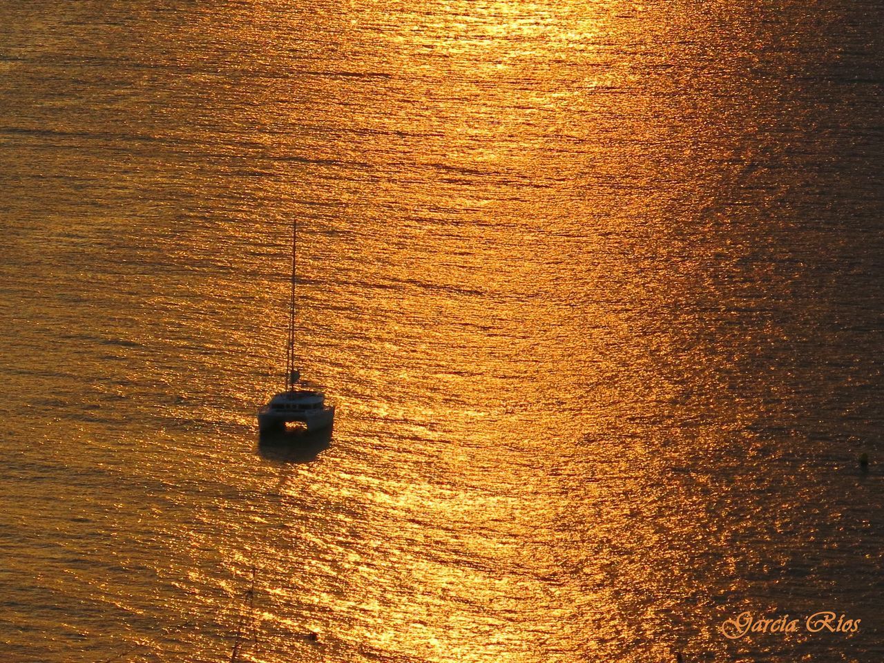 CLOSE-UP OF CRYSTAL BALL HANGING ON SEA