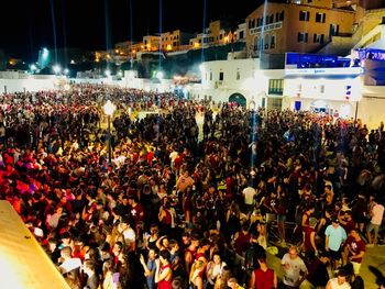 High angle view of people on street at night