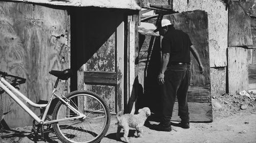 Man standing with dog