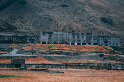 View of buildings against mountain