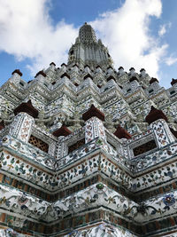 Low angle view of ornate building against sky