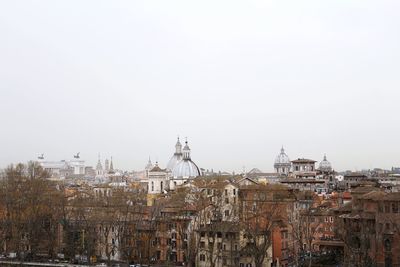 Cityscape against clear sky